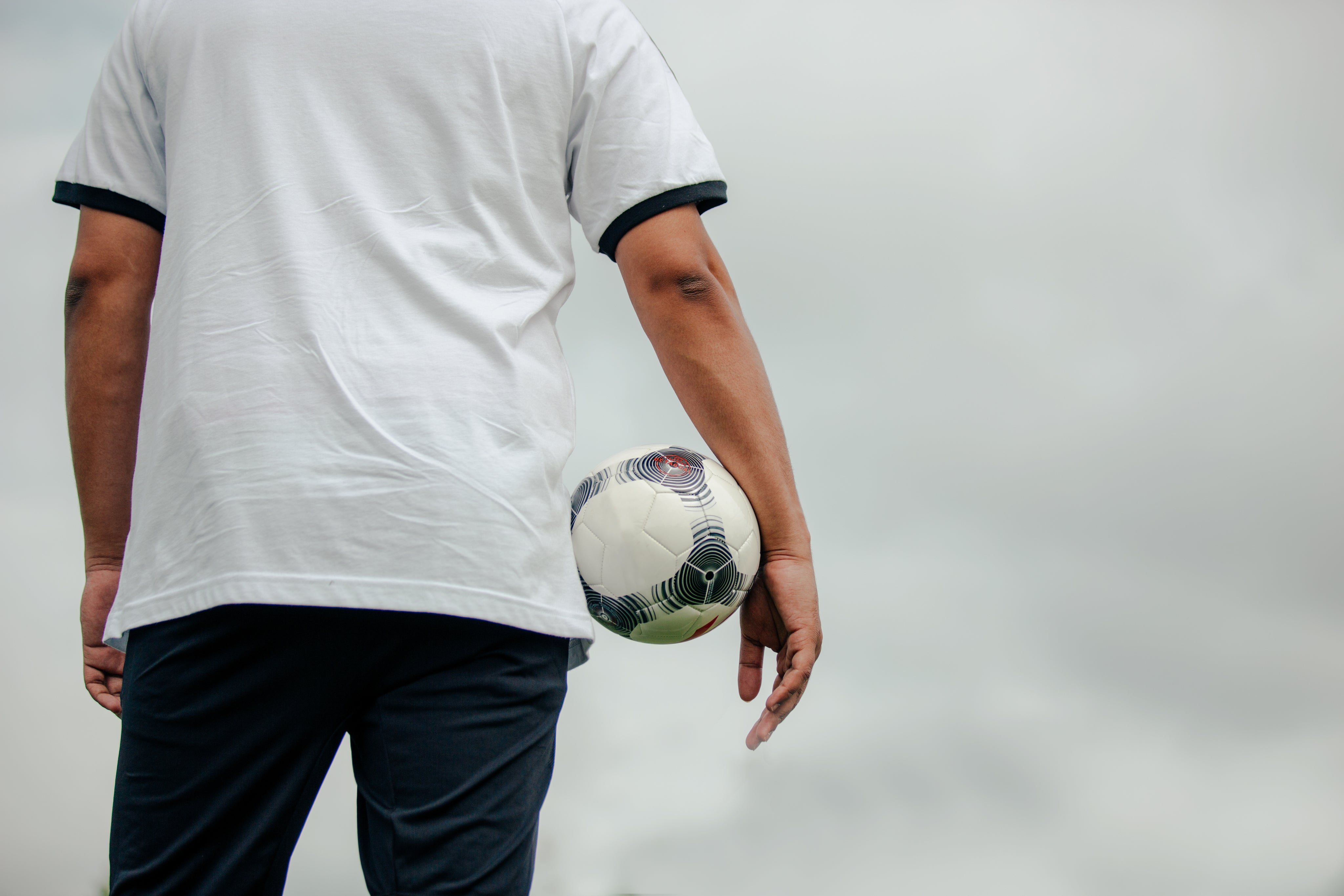epic-player-holding-soccer-ball.jpg